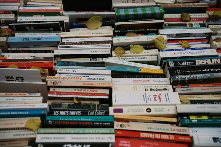 A pile of books sitting next to each other